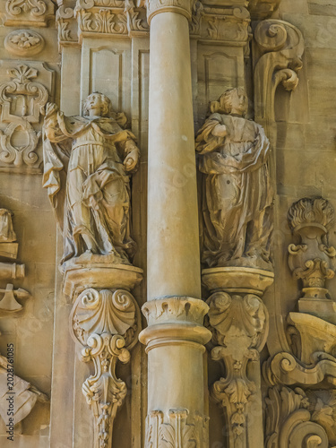 Manresa, Spain - October 1, 2025: Baroque sculptural detail at the Sanctuary of the Cave of Saint Ignatius in Manresa, Catalonia, Spain. Ornamental stone facade with religious statues