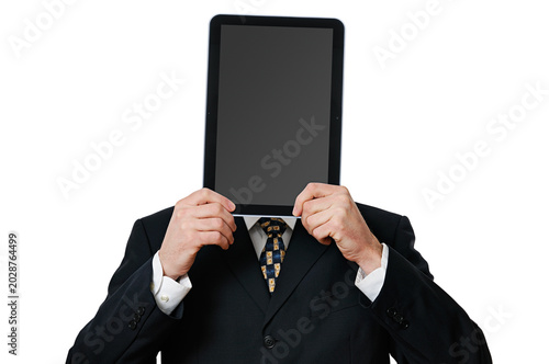 Anonymous businessman holding a tablet computer in front of his face