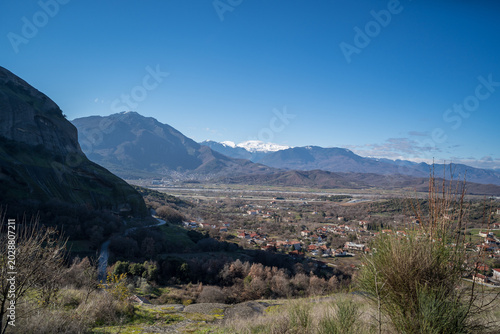 Panoramic view of Meteora Greece with mountains and village in the valley