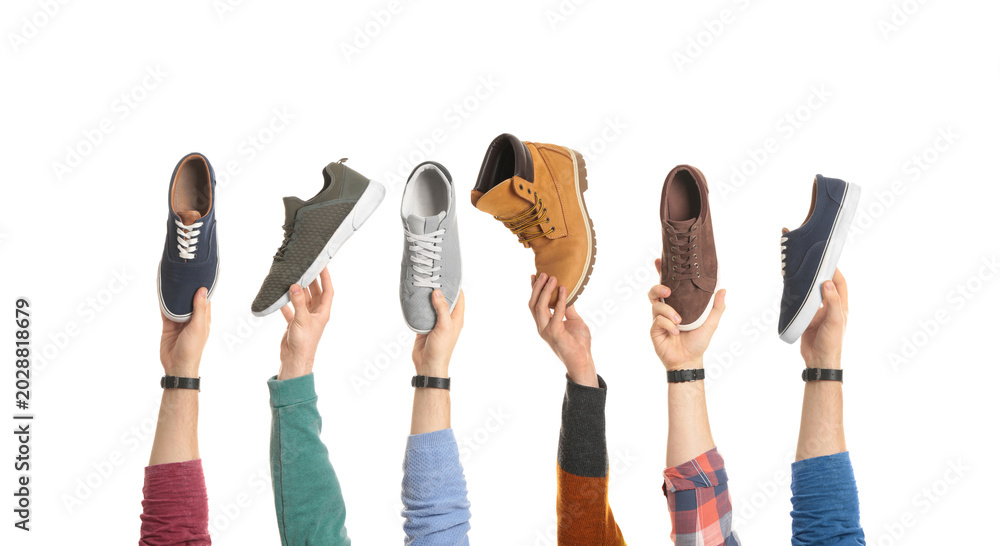 Fototapeta premium Men holding different shoes on white background, collection