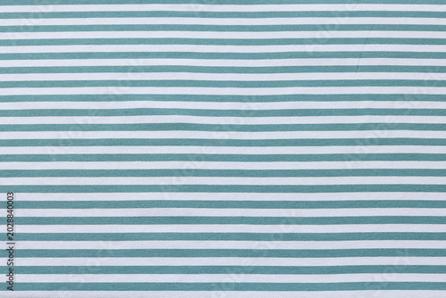 Smooth Blue and White Striped Linen Tablecloth Background. Top View