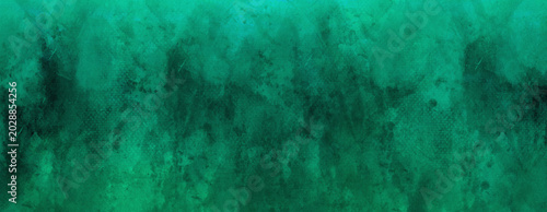 Fotografía The image shows a textured background with swirling patterns in shades of green and teal