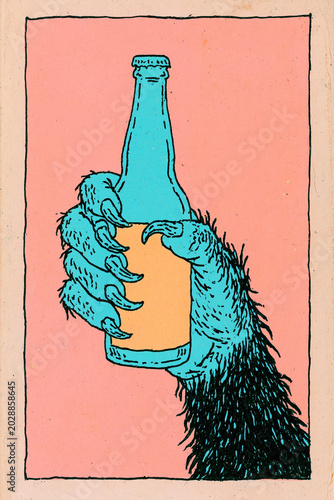 hairy werewolf hand with claws holding a beer bottle with blank label