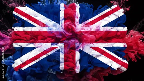 Abstract Red White and Blue Ink in Water Exploding to Reveal British Flag on Black Background