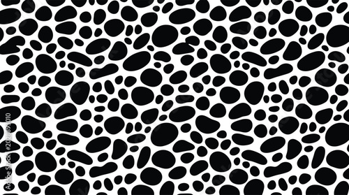 Billede på lærred Seamless pattern of scattered black organic pebble shapes on a white background,