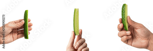 Bild auf Leinwand Hands Holding Fresh Cucumber Slices: Healthy Green Vegetable Sticks, Organic Sna