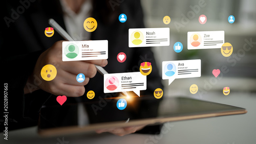 Canvastavla A person interacts with a tablet, showcasing virtual social media comments and reactions, creating a vibrant digital atmosphere in a modern workspace with emoji icons