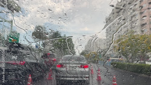 raining, droplet of water on Car mirror at Evening