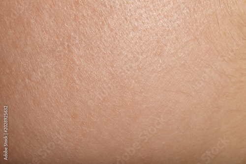 Fényképezés Texture of normal skin as background, closeup