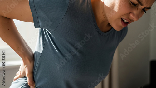 Adult Suffering from Lower Back Pain Healthcare and Orthopedic Concept
