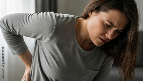 Adult Suffering from Lower Back Pain Healthcare and Orthopedic Concept