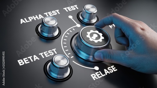 Hand turns dial to release software from beta test to release stage