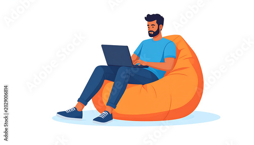 Young bearded man in casual attire comfortably working on a laptop while sitting on a cozy orange bean bag chair, illustrating modern remote work, freelance lifestyle, or relaxed studying