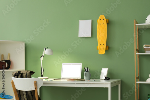 Workplace with blank laptop...