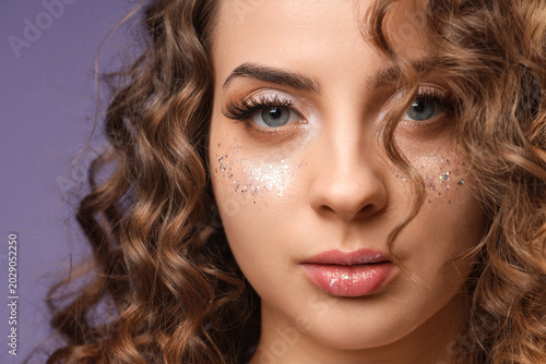 Beautiful young woman with ...