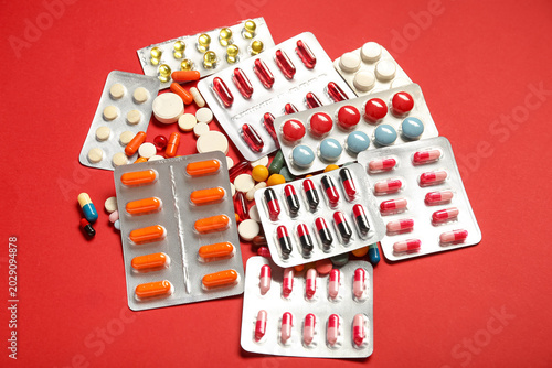 Heap of different pills on ...