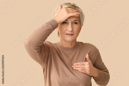 Mature woman suffering from...