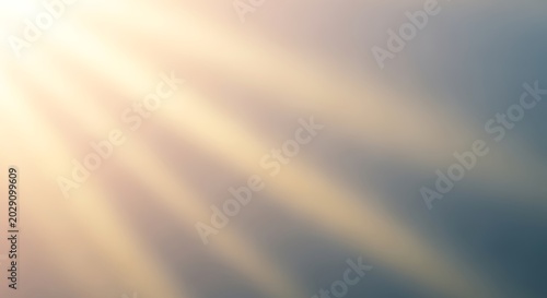 Sunlight rays shine through the atmosphere creating soft light.