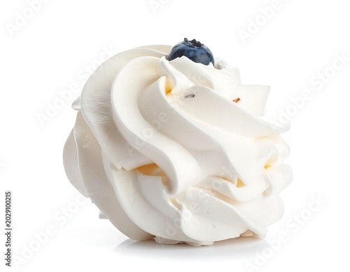 A pastry with white frosting and a blueberry