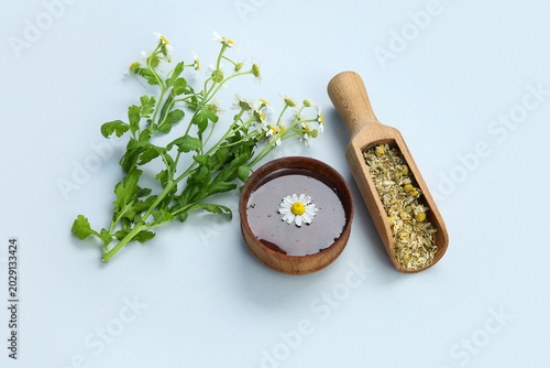 Chamomile flowers with herb...