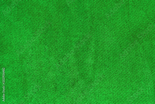 Acid green fabric woven texture macro background