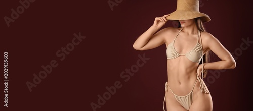 Young woman in stylish beig...