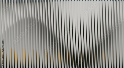 Abstract ribbed glass background with wavy vertical lines modern white architectural pattern and warm orange gradient light