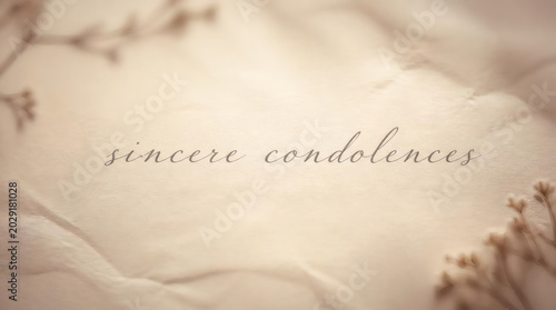sincere condolences cursive text on warm beige handmade paper background with soft gradient and subtle glow empathy sympathy compassion comfort serenity solace condolence card memorial grief support m
