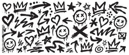 Foto Collection of hand drawn graffiti elements, spray paint style icons including crowns, hearts, arrows, smiley faces, stars, and abstract shapes