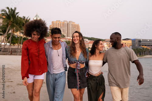 Friends traveling together, embracing adventure, laughter and unforgettable beach fun during a trip