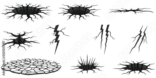Foto Set of black crack and hole designs for ground or wall destruction effects