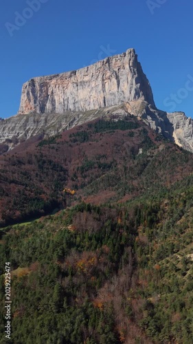 The Vercors Massif range with famous Mont Aiguille mountain peak in autumn (aerial view). Vercors Regional Natural Park, Isere, Rhone-Alpes, Alps, France