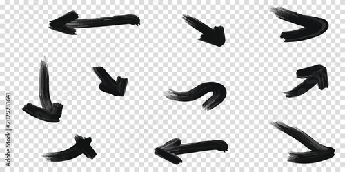 Obraz na płótnie Collection of nine black brush stroke arrows on a white background with hand drawn direction collection