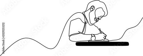 Foto Single continuous line drawing of a man concentrated on writing or drawing at his desk, creative workflow concept