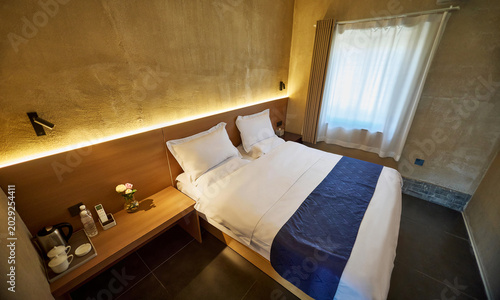 Retro-style guesthouse rooms redesigned in a modern Chinese style