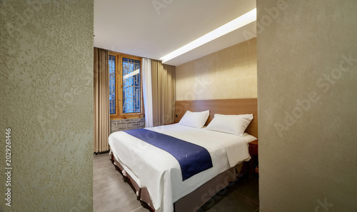 Retro-style guesthouse rooms redesigned in a modern Chinese style