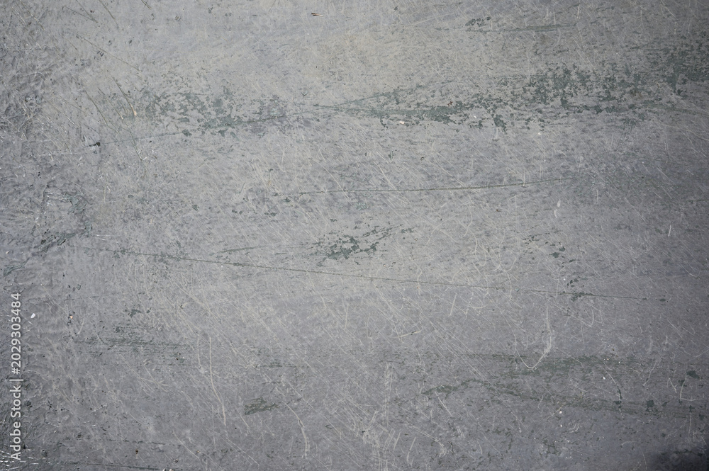 Fototapeta premium Grey background with green hints, metal texture
