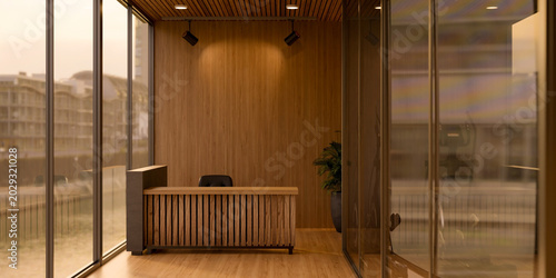 Cuadro en lienzo Wooden reception counter front desk table on parquet floor beside glass wall in
