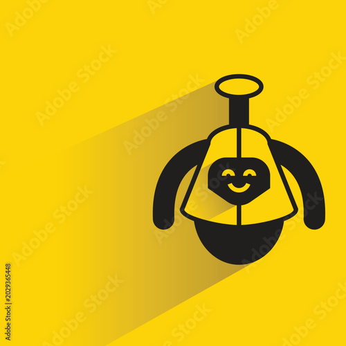 Obraz na plátne droid robot icon with shadow on yellow background