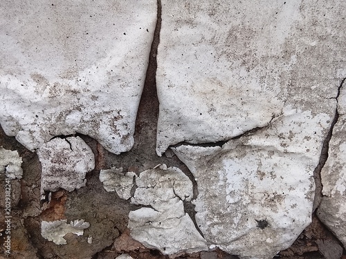 White Peeling Cracked Paint Texture on Aged Concrete Wall Background