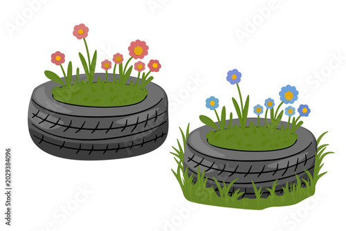 Tableau sur toile Old car tires upcycled into creative garden flower beds set