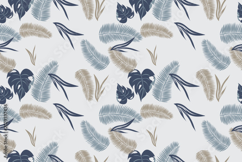 Seamless tropical pattern with palm leaves and monstera in blue and beige tones. Botanical design perfect for summer fabric, wallpaper, and background.
