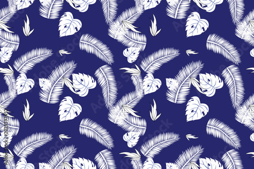 Seamless tropical pattern with palm leaves and monstera in blue and beige tones. Botanical design perfect for summer fabric, wallpaper, and background.

