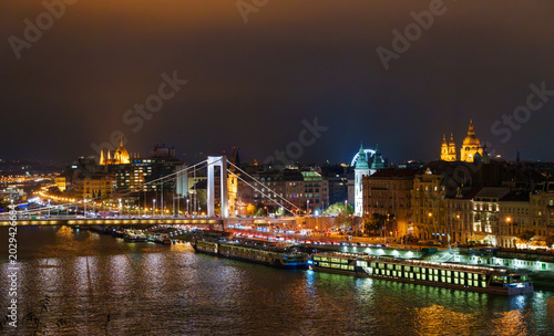 Принти на полотні Cinematic night view of Budapest city skyline across the mighty Danube River sho