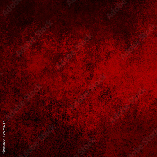 Spooky crimson red background with dark black shadows and creepy grunge stains