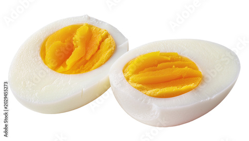 Vászonkép Two halves of a hard-boiled egg showing white albumen and yellow yolk
