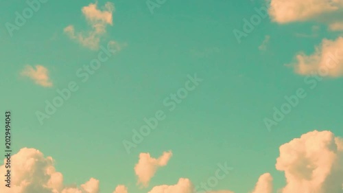 Pure Clear Sunny Azure Sky Cumulus Puffy White Yellow Clouds in Sunlight, Time lapse, Slow Motion. Blue Evening Sky with Fluffy Clouds and Sun Timelapse.