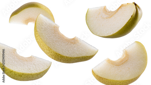 Fotografie Pear slices with green and yellow skin and white flesh