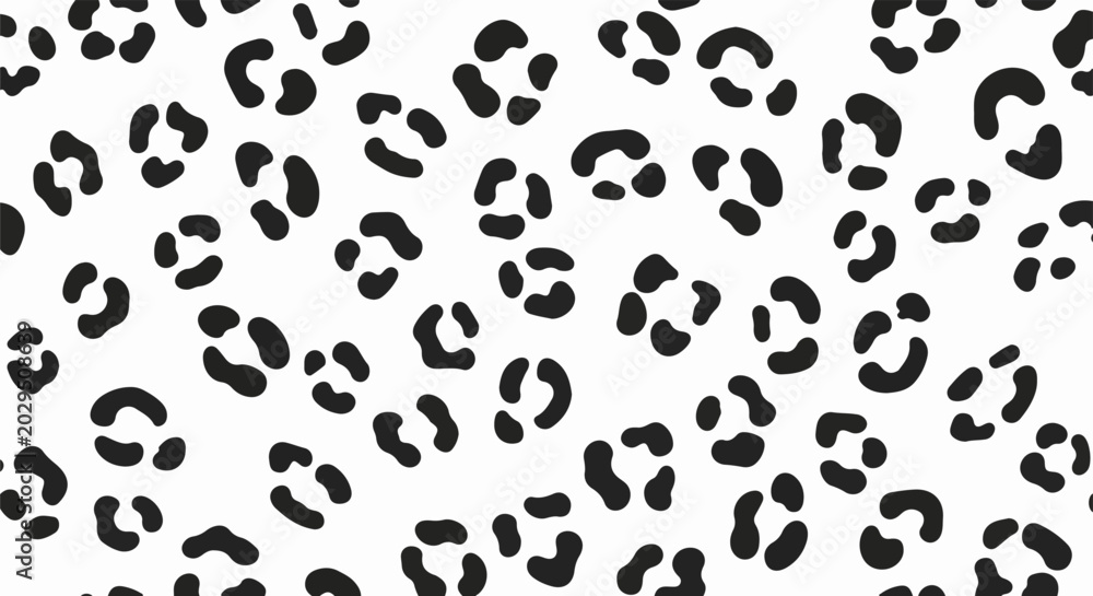 Fototapeta premium A repeating black leopard spot pattern on a white background
