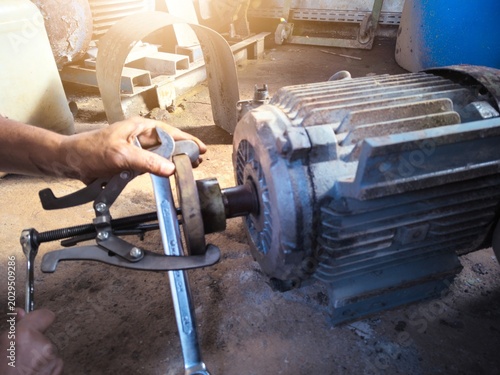 Tableau sur toile Concept of repair and disassembly of three-phase induction motors